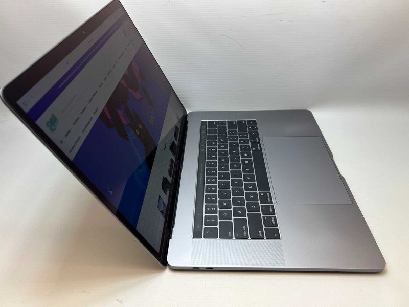 MacBook Pro 15 inch 2017 TouchBar with i7 @ 2.9 GHz 16GB RAM & 512GB READ  -