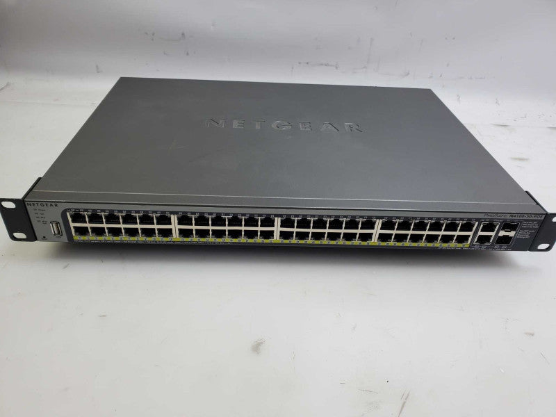 Netgear M4100-50-PoE ProSafe 48-Port  Ethernet Switch )