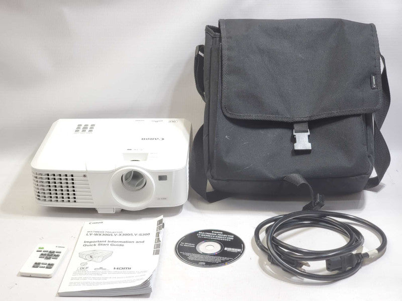 Canon LV-X300 Projector with power cord, carrying bag, and remote +