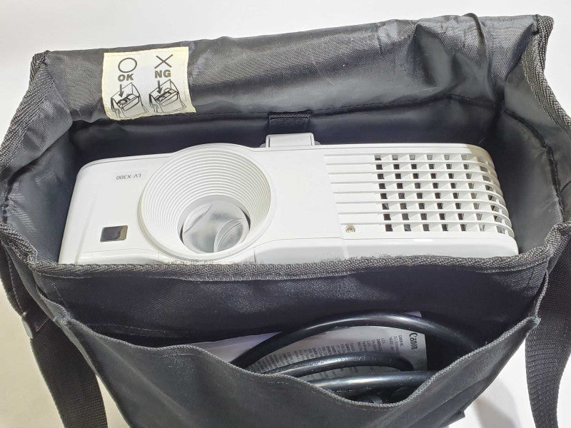 Canon LV-X300 Projector with power cord, carrying bag, and remote +