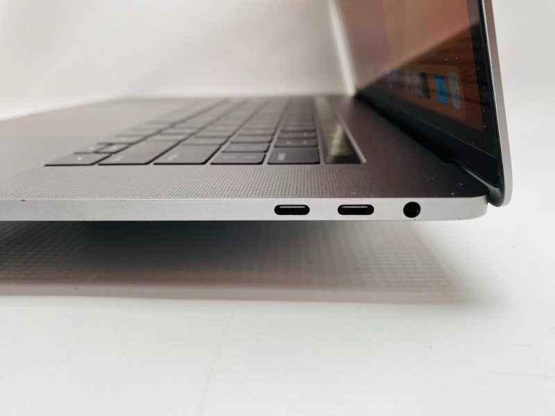 MacBook Pro 15-inch TouchBar 2017 with i7-7700HQ CPU 16GB RAM & 250GB READ  -