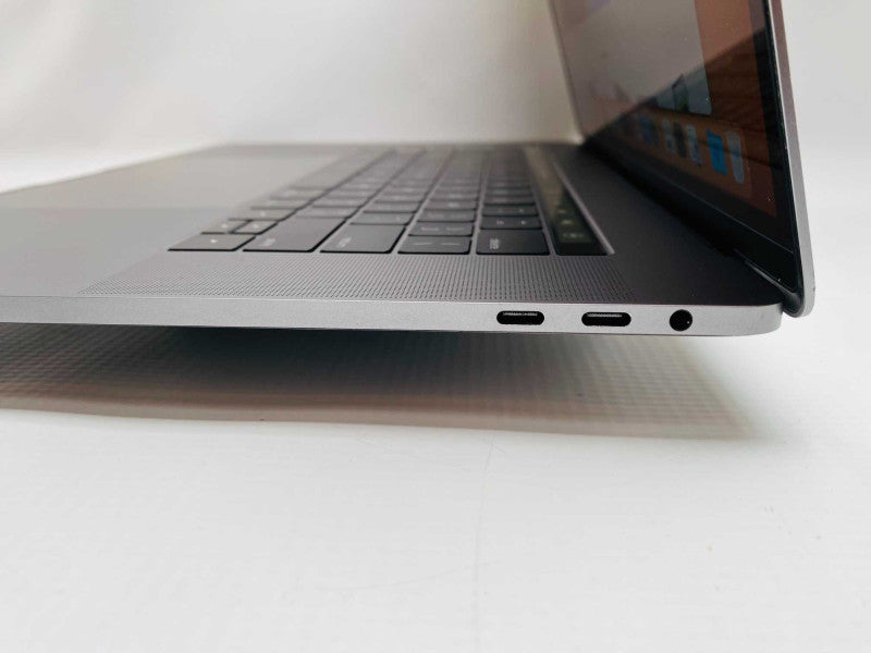 MacBook Pro 15-inch TouchBar 2017 with i7-7700HQ CPU 16GB RAM & 250GB READ  -
