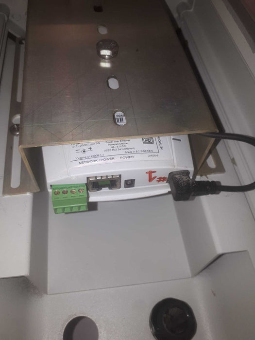 AXIS Communications P1347 Network Security Camera inside Pelco case