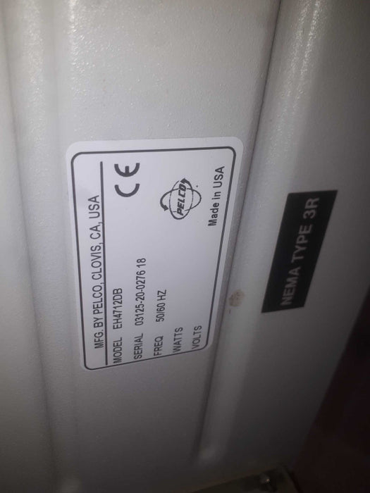 AXIS Communications P1347 Network Security Camera inside Pelco case