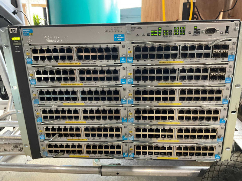 HP E5412 J8698A with 10x J8702A 2x J8705A modules and 4x J8712A Power Supply -