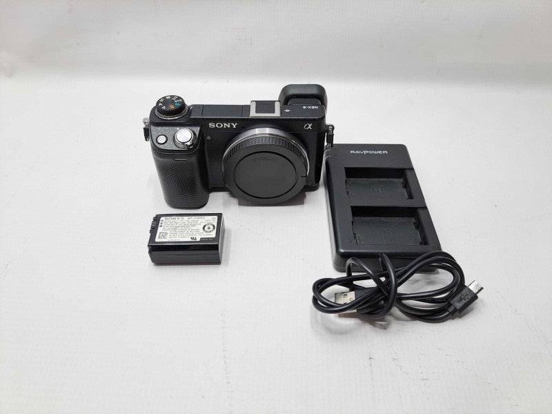 Sony NEX-6 Mirrorless Digital Camera Body- Black {16.1 M/P} + Battery&Charger )