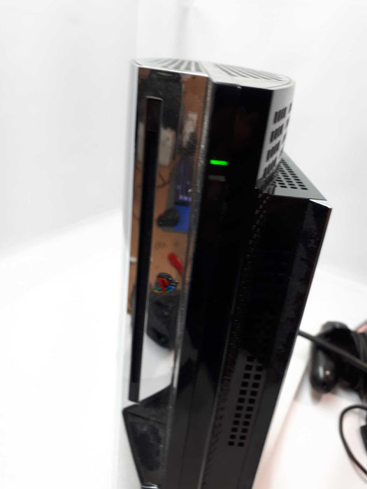 Sony Play Station 3 PS3 FAT  with 2 controller and one CD &