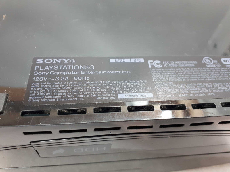 Sony Play Station 3 PS3 FAT  with 2 controller and one CD &