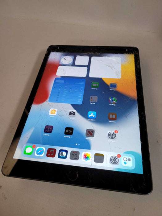 Apple iPad 9th Gen 64GB (A2602) - READ