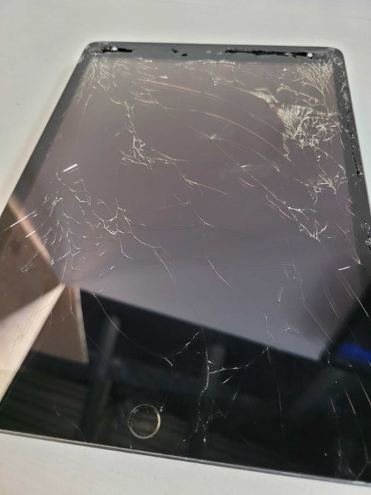 Apple iPad 9th Gen 64GB (A2602) - READ
