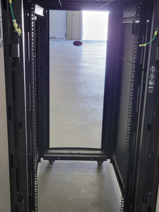 APC NetShelter SX Server Rack Enclosure, 24U, Black, 116x107x59cm (H,D,W) SEE _