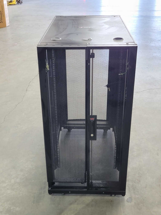 APC NetShelter SX Server Rack Enclosure, 24U, Black, 116x107x59cm (H,D,W) SEE _
