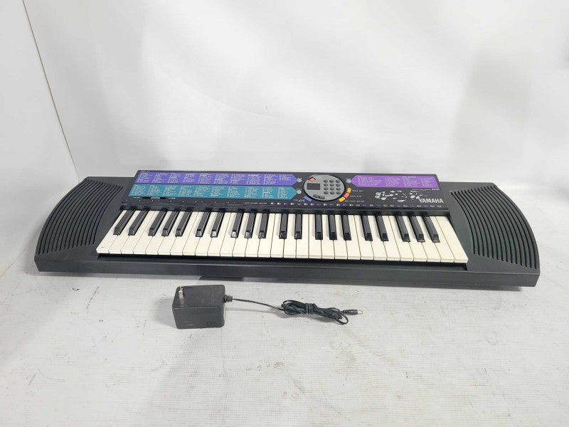 Yamaha PSR-77 Advanced Wave Memory Keyboard. Includes A/C Adapter