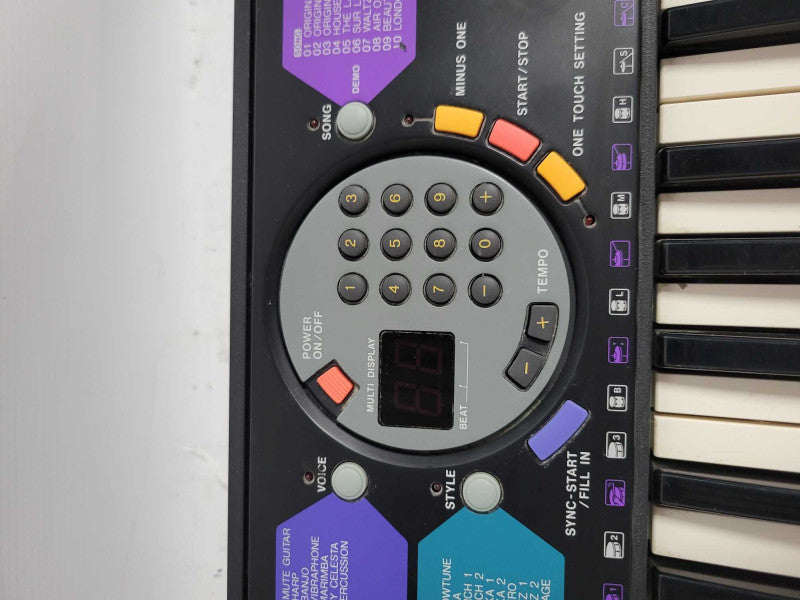 Yamaha PSR-77 Advanced Wave Memory Keyboard. Includes A/C Adapter