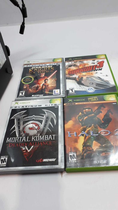 Xbox game console with controllers, cables and CDs &
