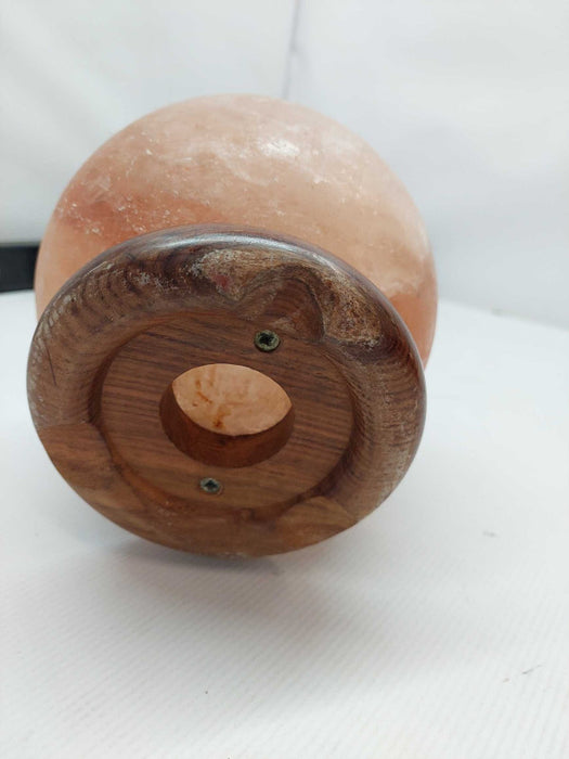 Polished Himilayan Salt Rock on wooden pedestal