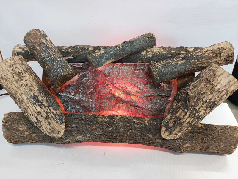 Logs Of Fire , Simulates a burning fire with a spinning fake log , electric