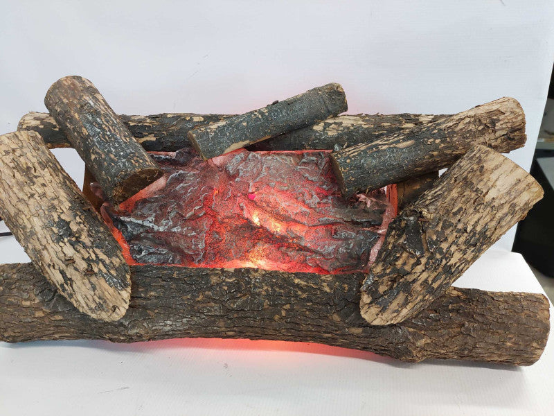 Logs Of Fire , Simulates a burning fire with a spinning fake log , electric