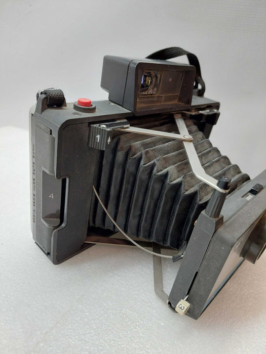 Vintage Polaroid Automatic 210 Land Camera with strap ?
