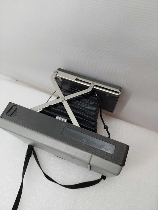 Vintage Polaroid Automatic 210 Land Camera with strap ?