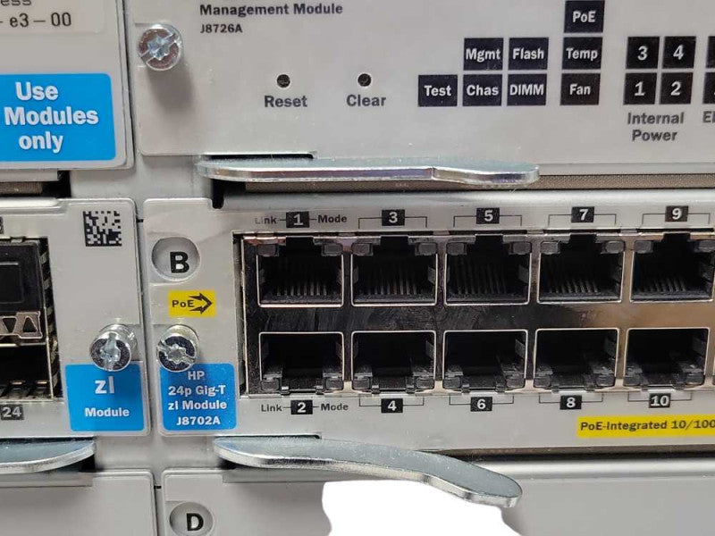 HP ProCurve J8697A Switch with 1x J8706A, 1x J8702A modules, and 2x PSU _