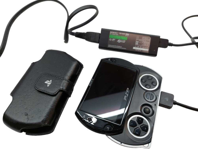 Sony PSP GO PSP-N1001 with Sony Charging AC Adaptor PSP-N100  =