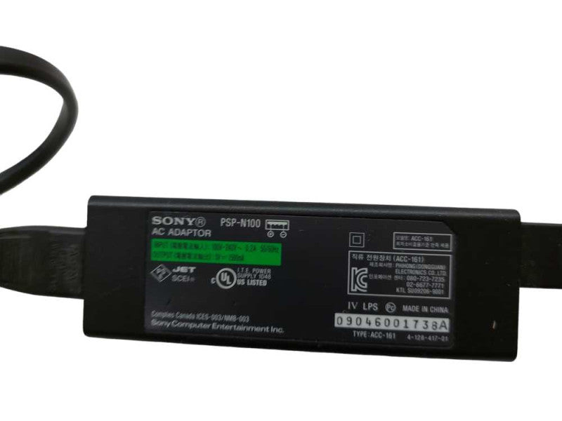 Sony PSP GO PSP-N1001 with Sony Charging AC Adaptor PSP-N100  =