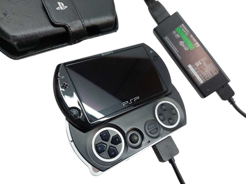 Sony PSP GO PSP-N1001 with Sony Charging AC Adaptor PSP-N100  =