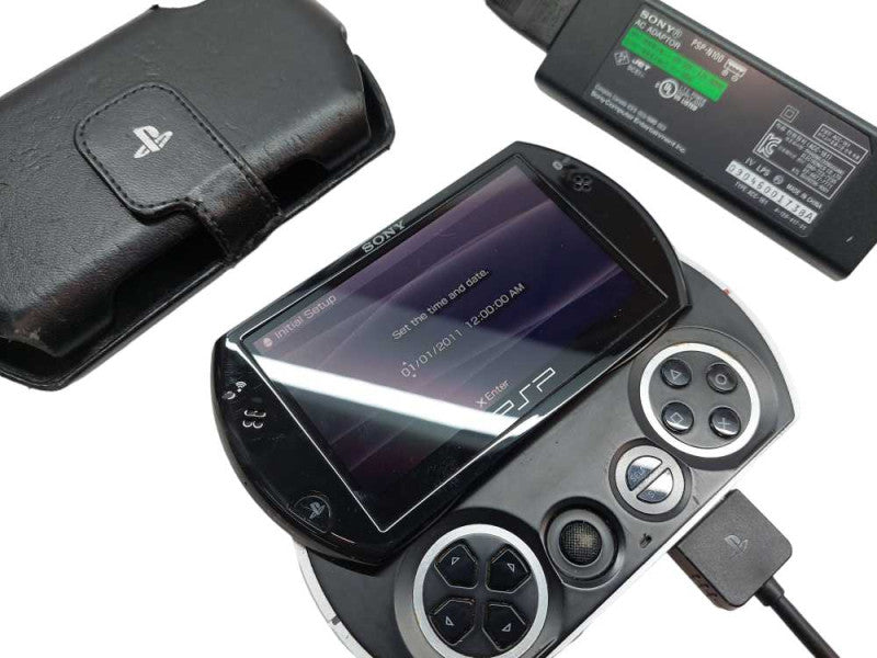 Sony PSP GO PSP-N1001 with Sony Charging AC Adaptor PSP-N100  =