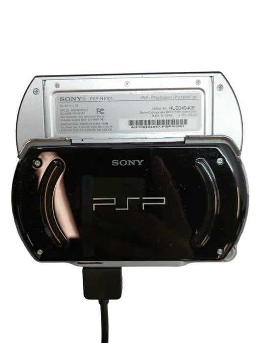 Sony PSP GO PSP-N1001 with Sony Charging AC Adaptor PSP-N100  =