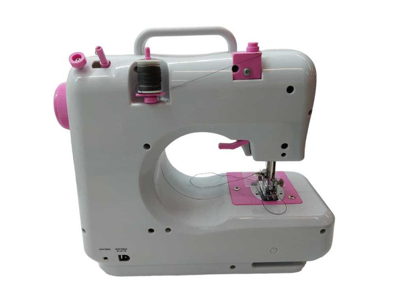 Battery Operated Small Pink Sewing Machine  =