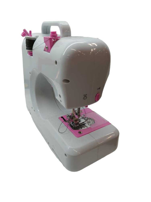 Battery Operated Small Pink Sewing Machine  =