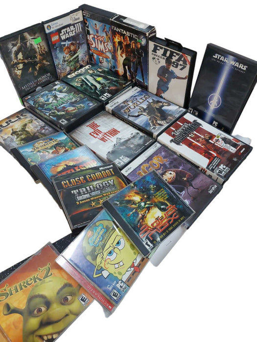 Bundle of 18 Random PC Games Variety & 1 Sega Genesis Game Fifa 97 =