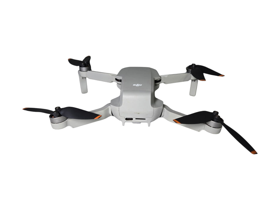 DJI Mini 2 - Ultralight Foldable Drone with Remote Controller & Battery Hub