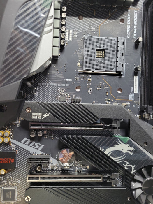 MSI MPG X570 GAMING PRO CARBON WIFI ATX AM4 Motherboard, read _
