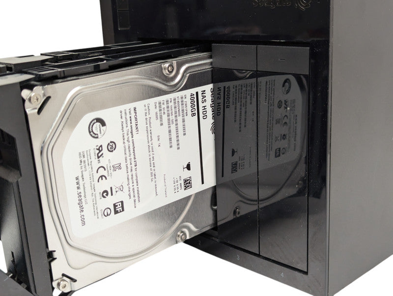 Seagate NAS 4-Bay PRO Model SRPS40 with 2 4TB HDDs installed  -