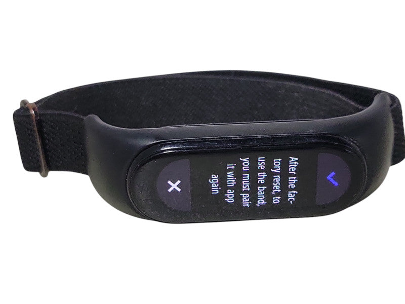 Unknown model Fitness Tracker with USB Charging Cable, READ _
