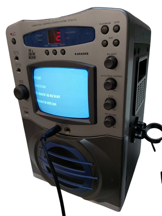 The Singing Machine Karaoke Machine with Mic & 2CD'S =