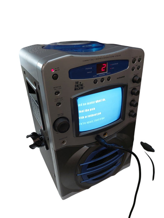 The Singing Machine Karaoke Machine with Mic & 2CD'S =