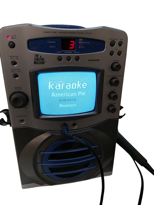 The Singing Machine Karaoke Machine with Mic & 2CD'S =