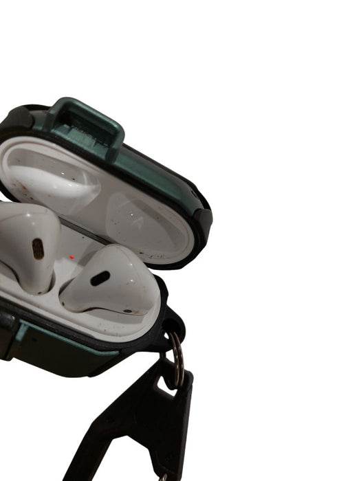 Apple Airpods 1st Gen Model:A1602 with a hardshelled case  =