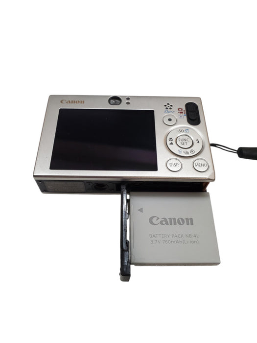 Canon PowerShot SD1000 Digital ELPH 7.1MP Digital Camera + Battery