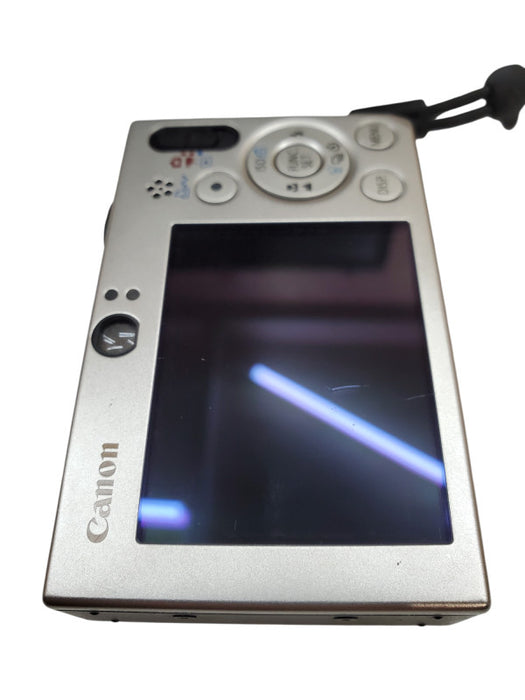Canon PowerShot SD1000 Digital ELPH 7.1MP Digital Camera + Battery