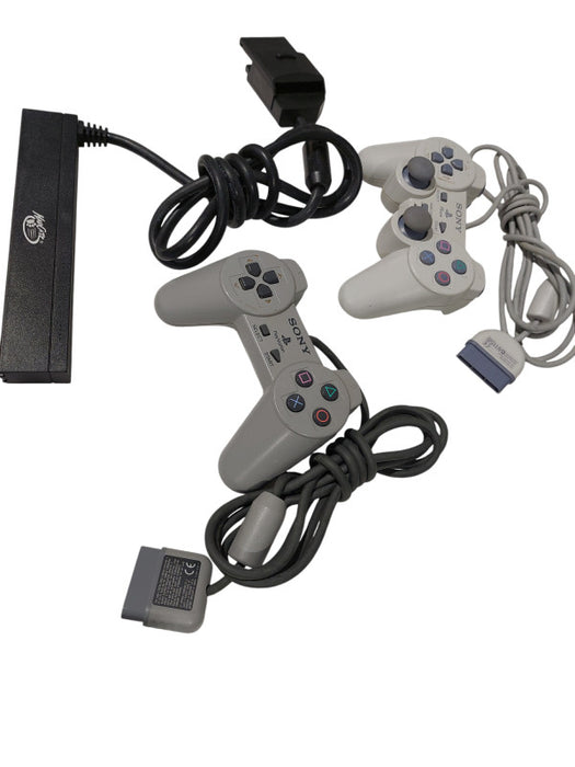 Playstation Controllers Bundle of 2 PS1 Controllers & a MultiPort Adaptor   =