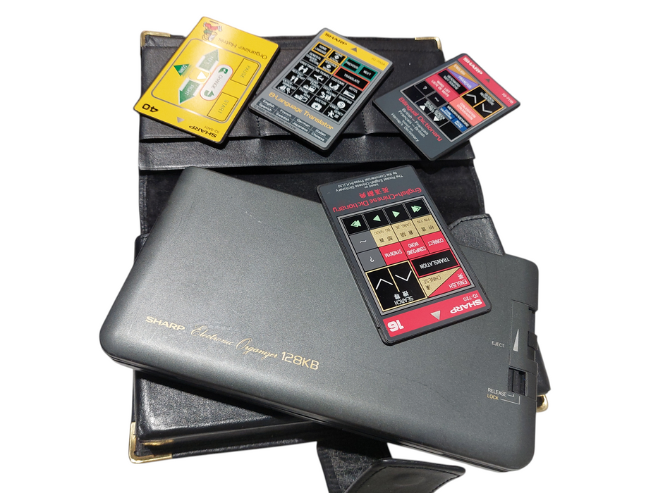 Sharp Electronic Organizer 128KB Model: IQ-8200 with Extra Cards  =