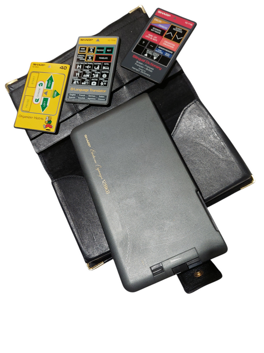 Sharp Electronic Organizer 128KB Model: IQ-8200 with Extra Cards  =