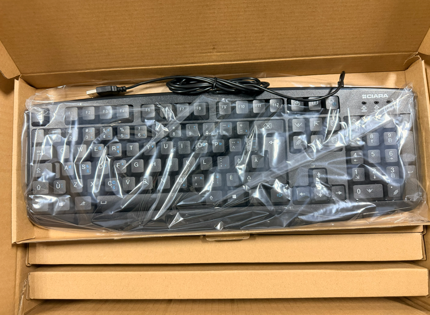 Pallet approx 700lbs French wired keyboards Q