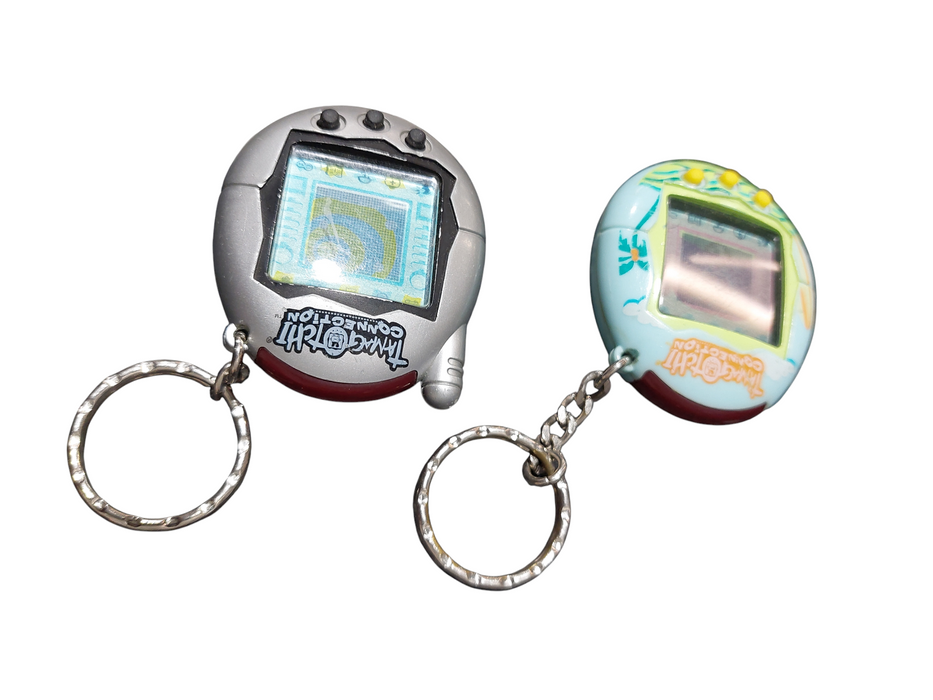 2 TAMAGOTCHI's Connection Beach Day & Silver/Black Bandai 2004 =