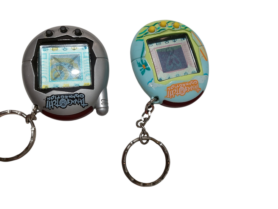 2 TAMAGOTCHI's Connection Beach Day & Silver/Black Bandai 2004 =