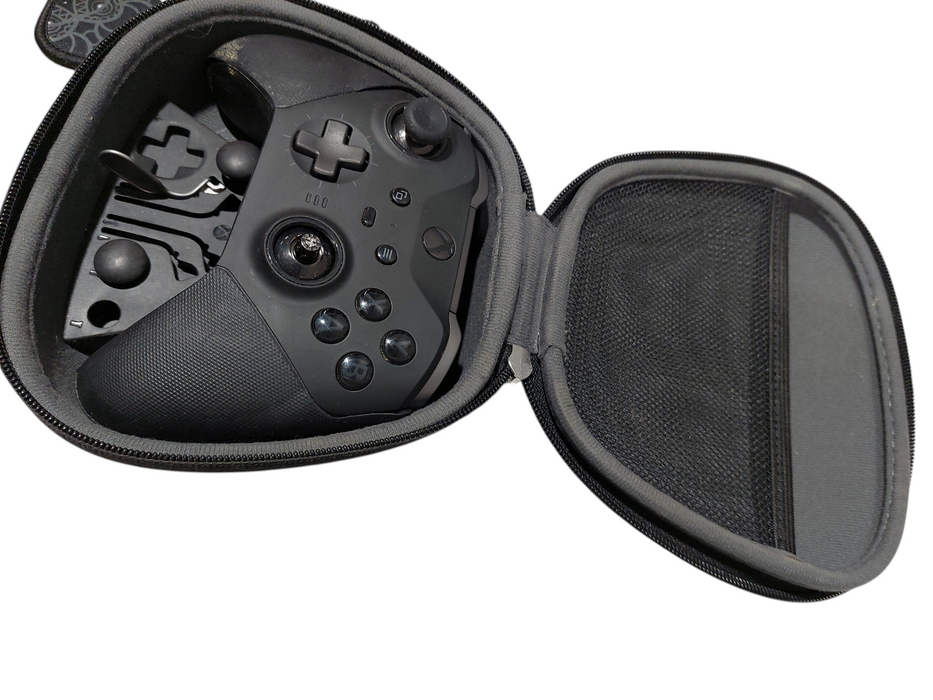 Xbox Series X Elite Series 2 ControllerModel1797with a case and some pieces =